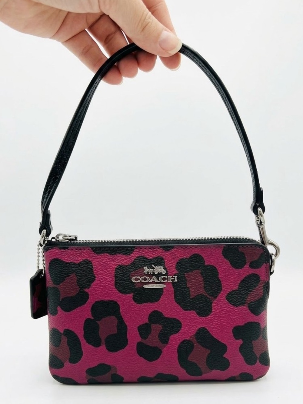 Coach like new OCELOT PRINT Wristlet (F64238) $75 MSRP